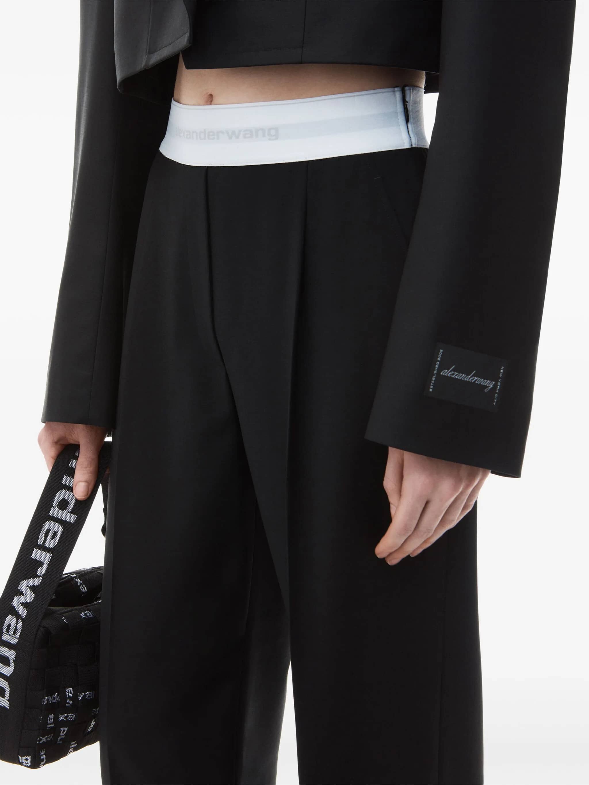 Pantaloni con banda logo