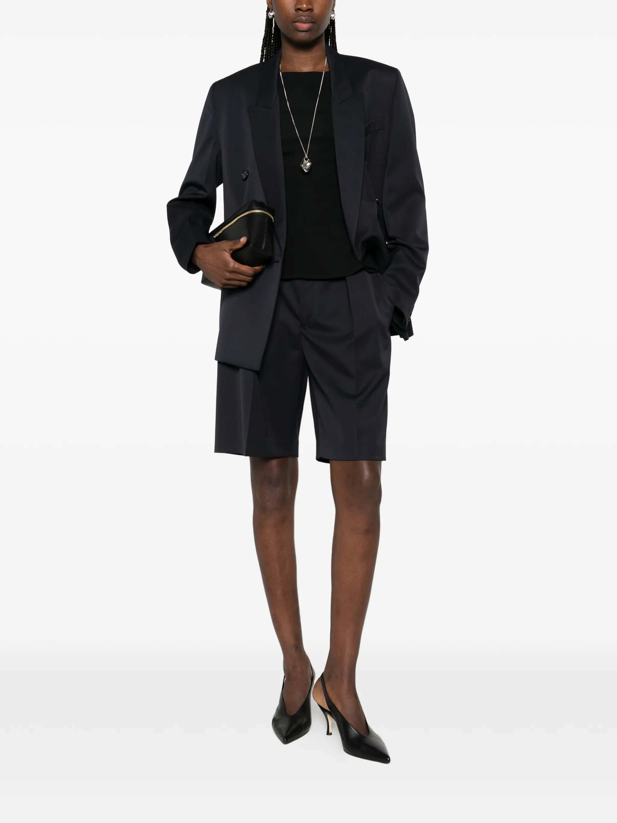 Shorts con pieghe frontali