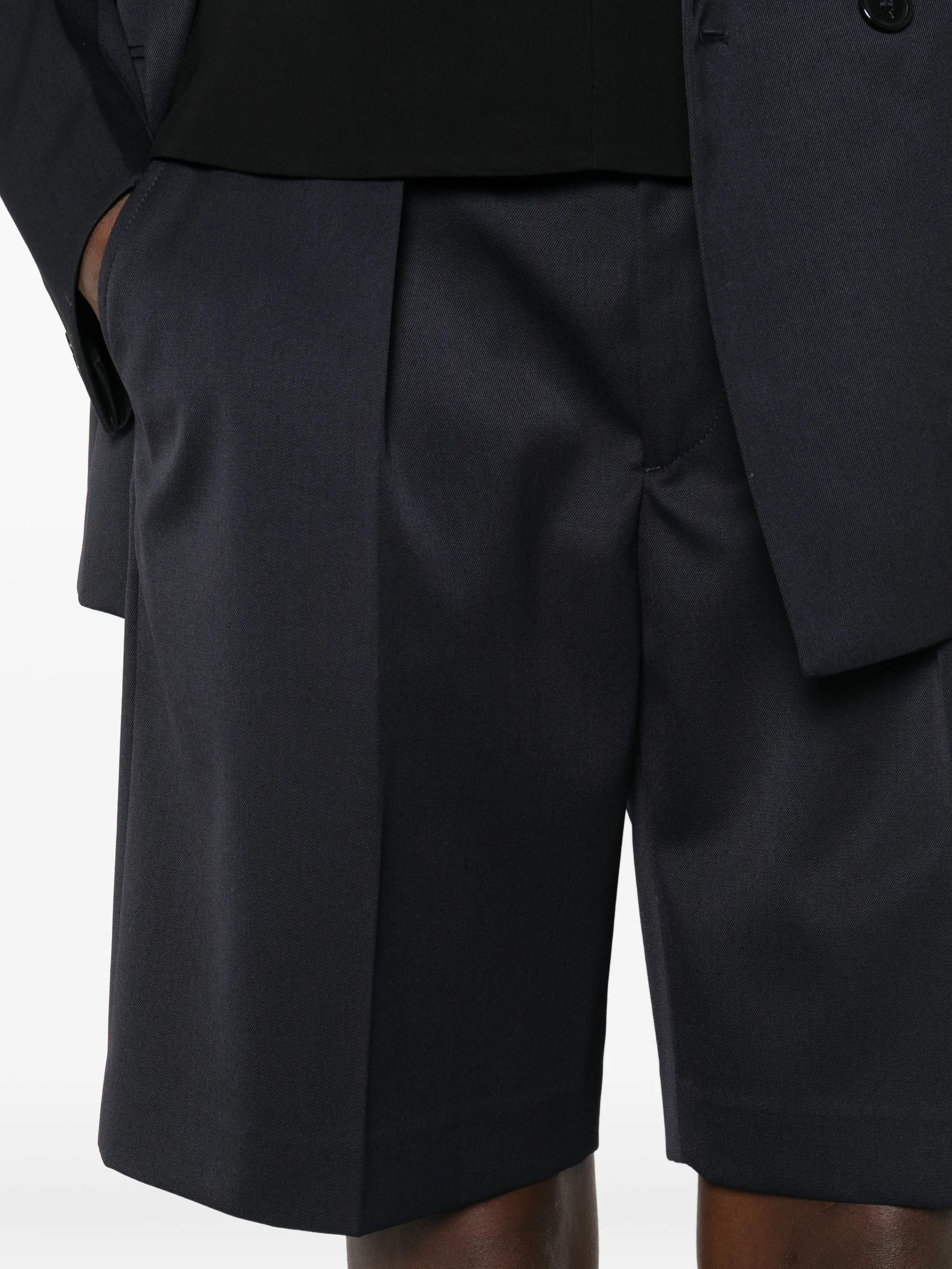 Shorts con pieghe frontali