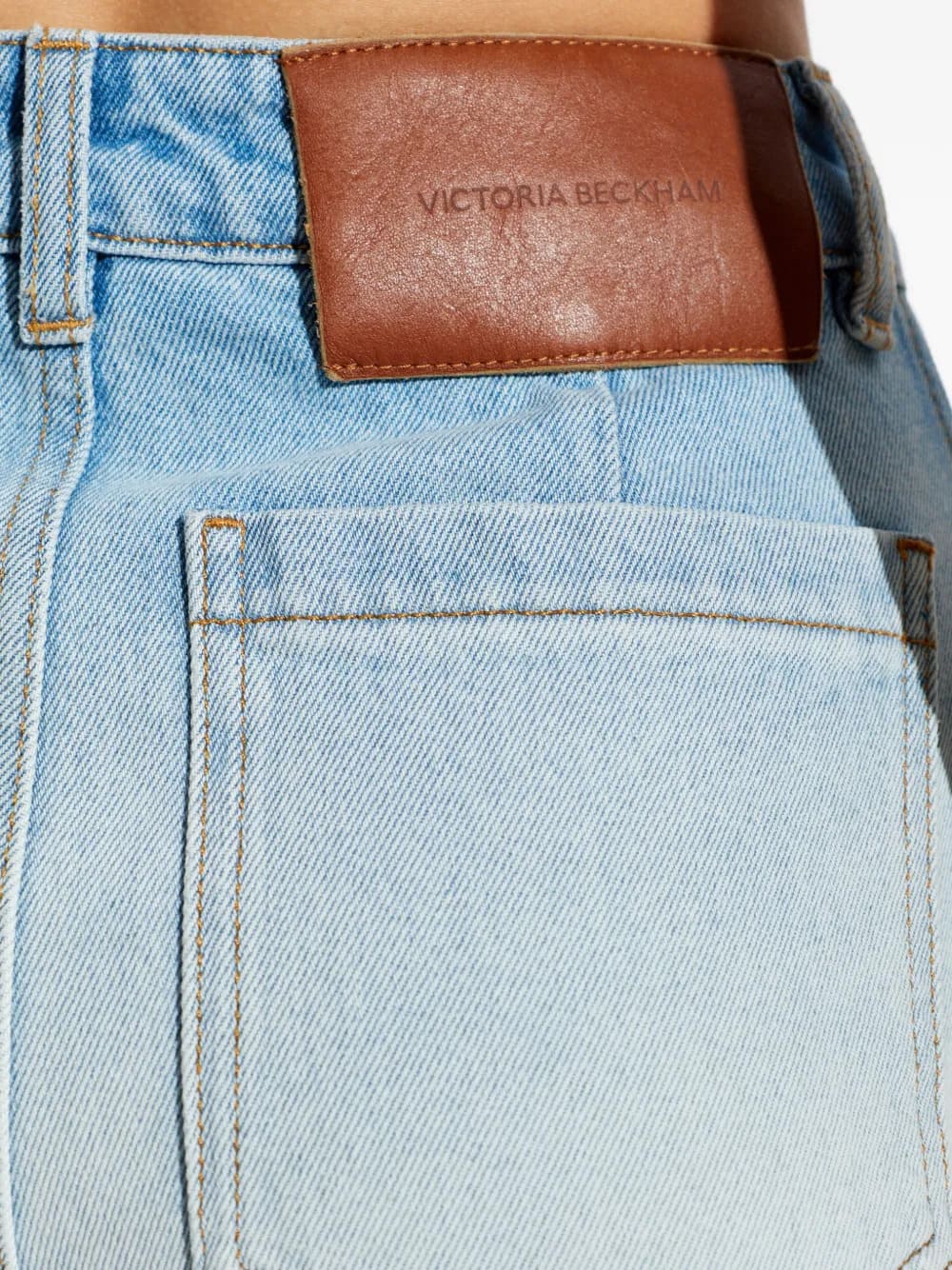 jeans con tasche applicate