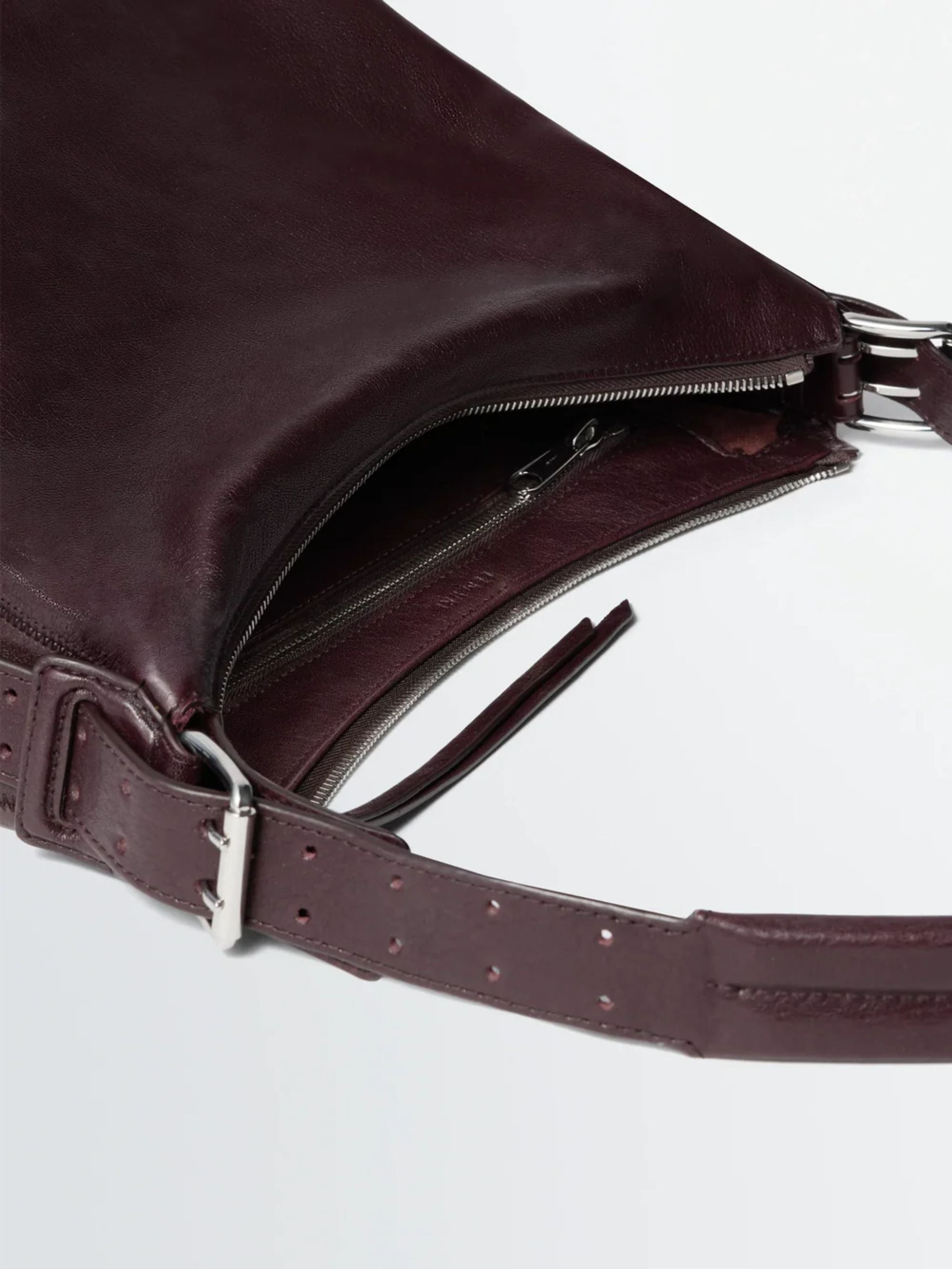 SMALL BELTED HOBO BAG IN LEATHER