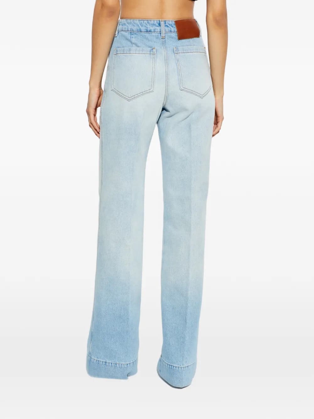 jeans con tasche applicate