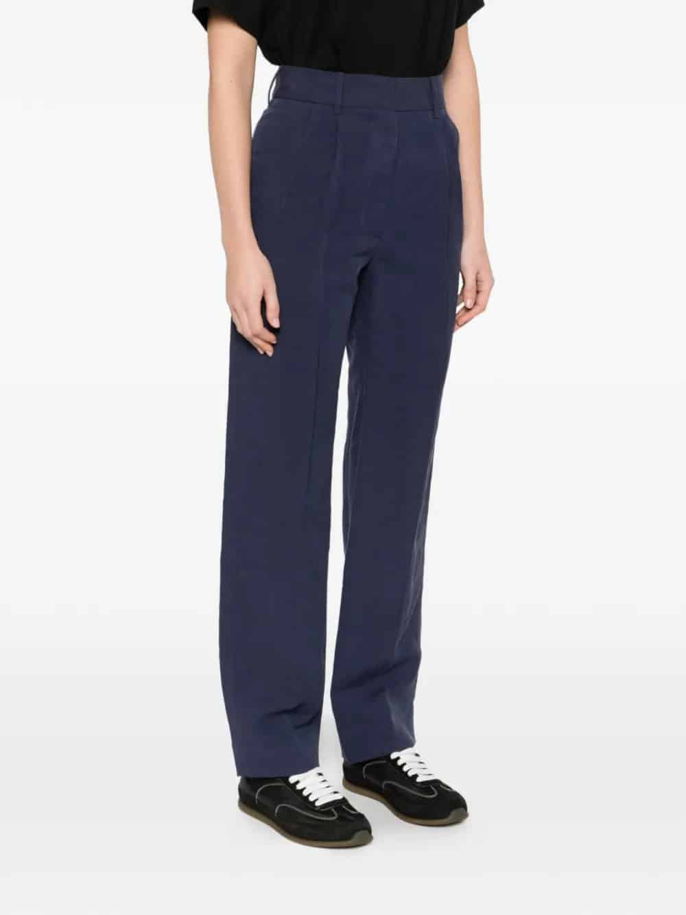 pantaloni con design a pieghe