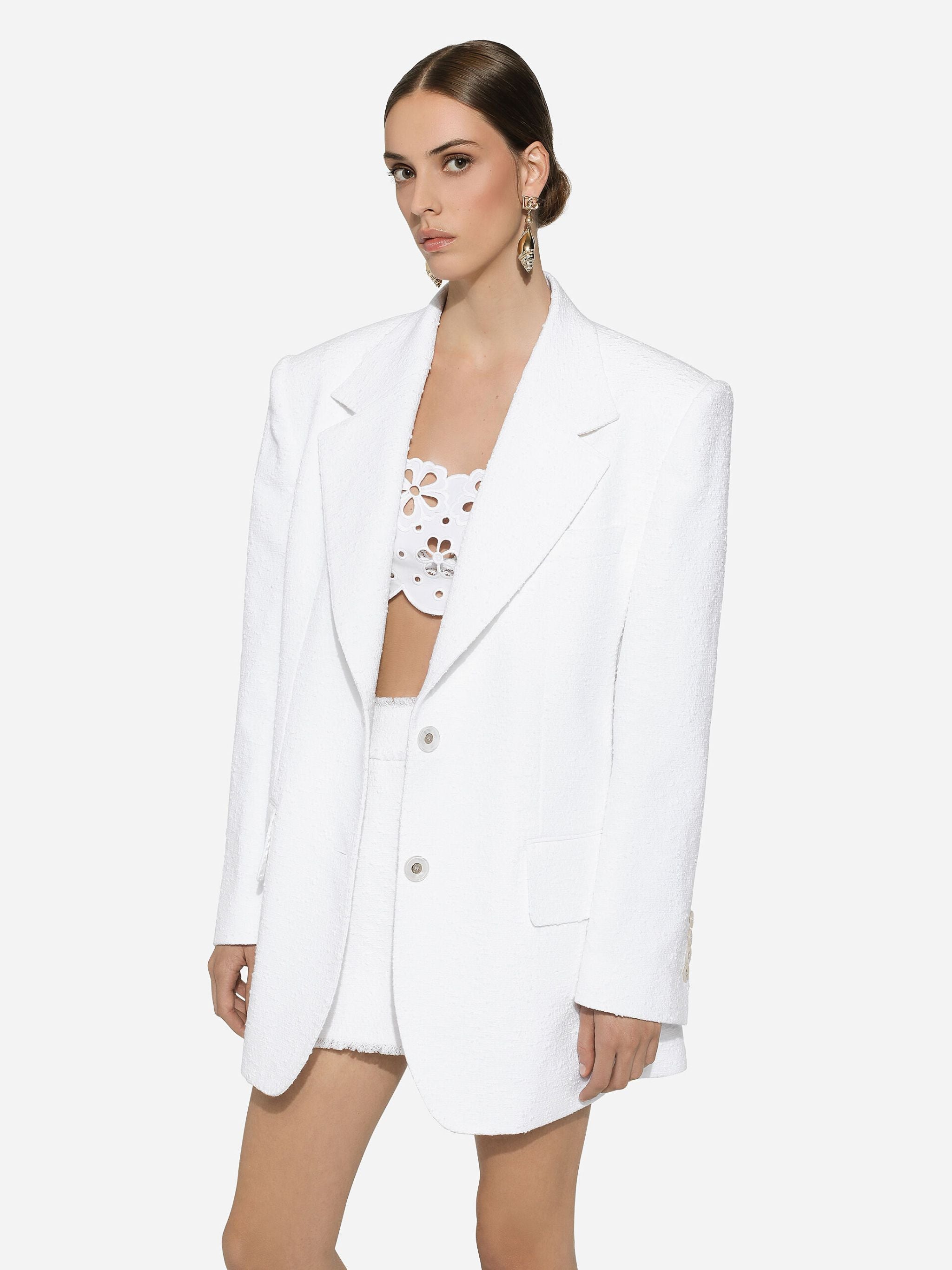 Top in cotone con ricamo cut out