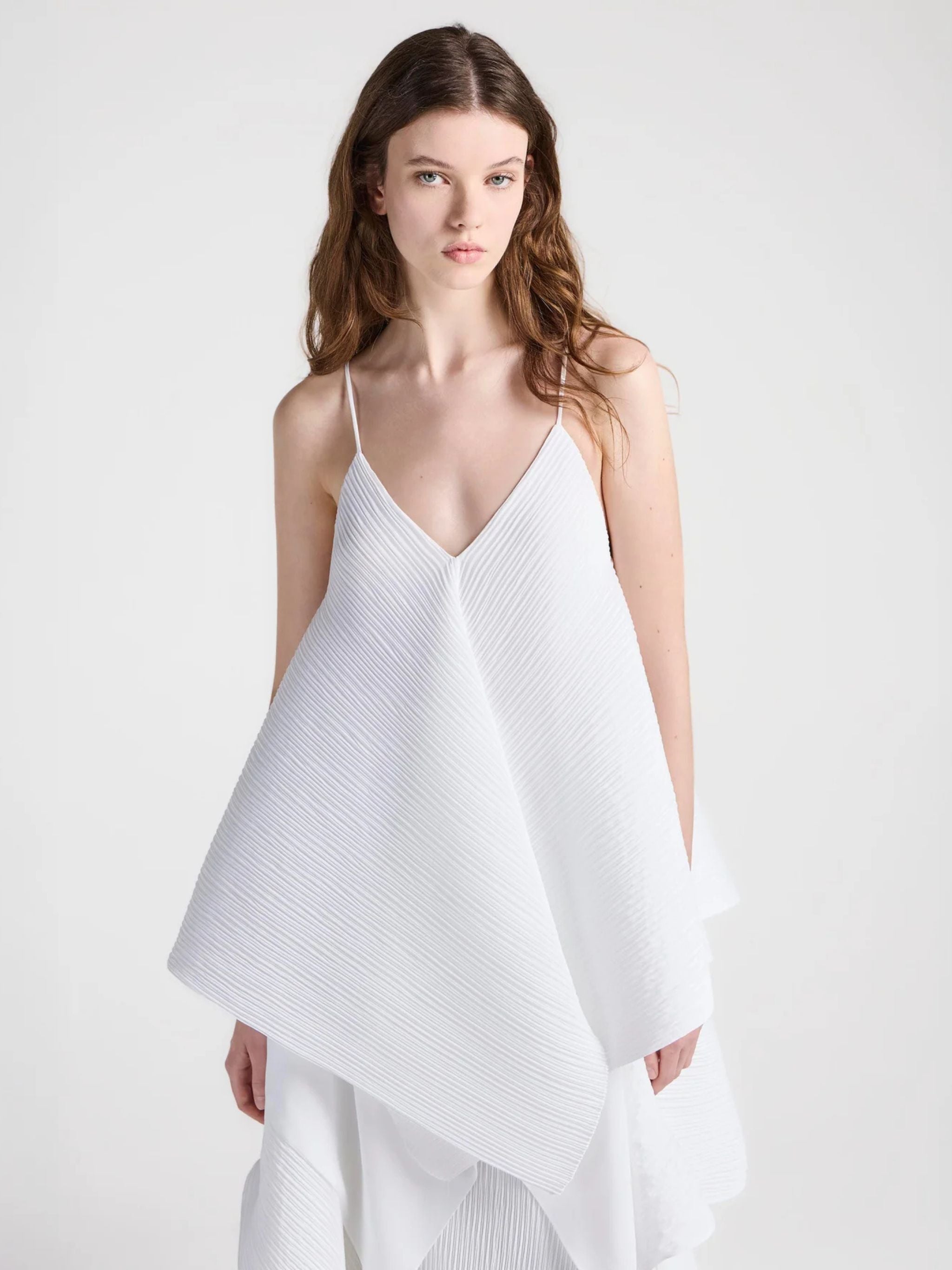 Womens asymmetric pleated top in white